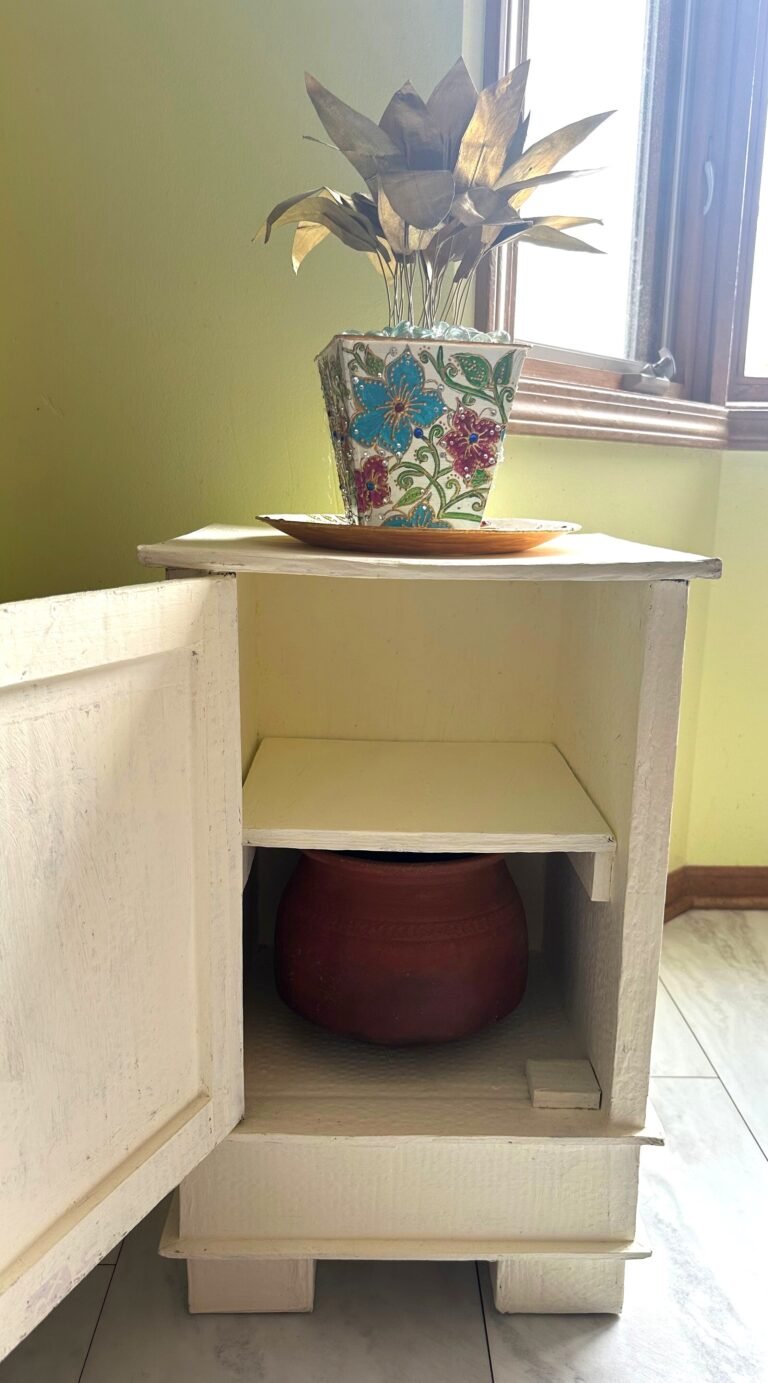 Faux-wood Architectural Forms: A Stylized Medallion Accent Cabinet