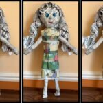 An Incredible Doll Made Entirely Out Of Newspaper, Even Clothes and Hair!